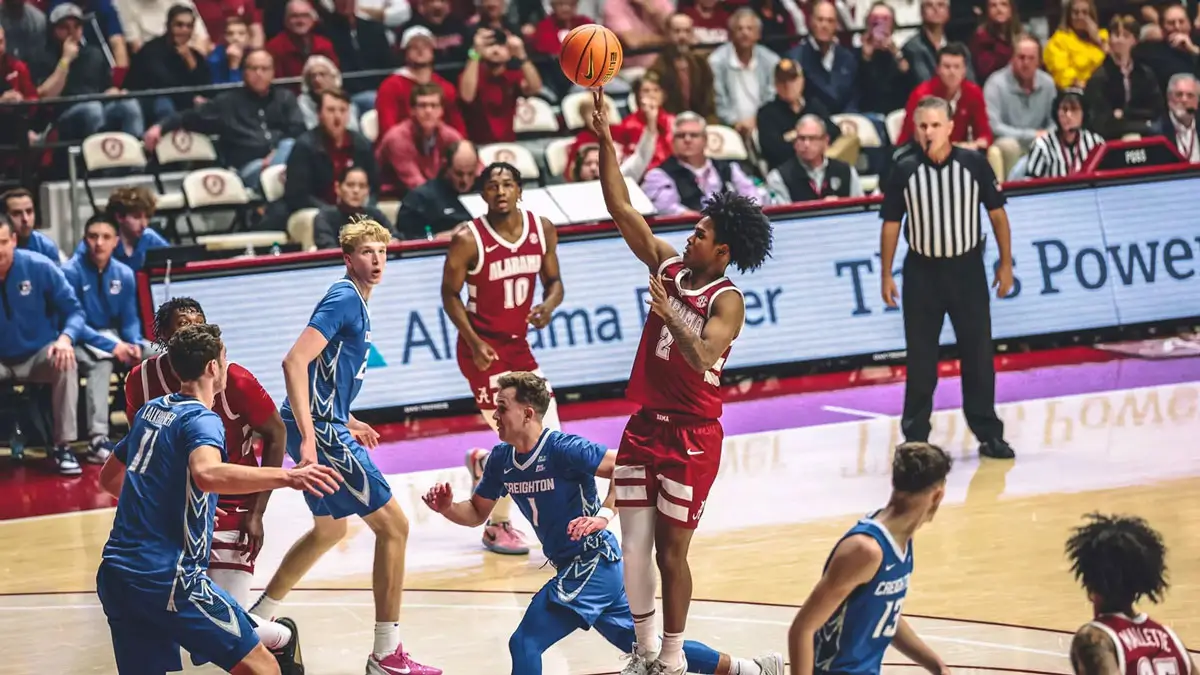 aden holloway shoots floater in non conference match up with creighton bluejays