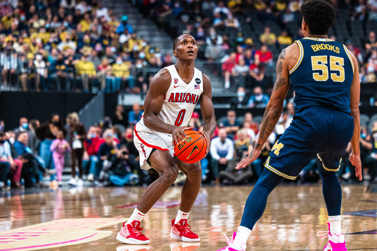 Arizona wildcats canadian basketball player bennedict mathurin attempts three point shot against michigan wolverines