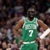 Boston celtics guard jaylen brown wearing protective face mask 2023 nba playoffs
