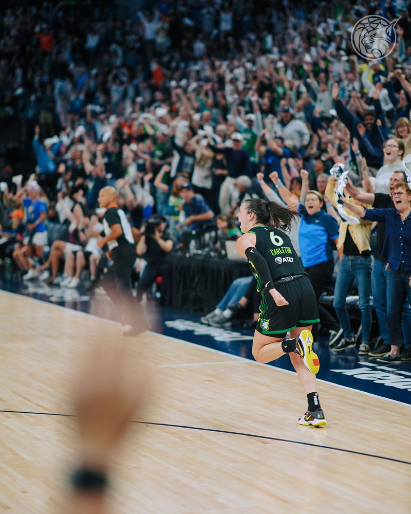 Bridget carleton of the minnesota lynx celebrates after hitting a three pointer