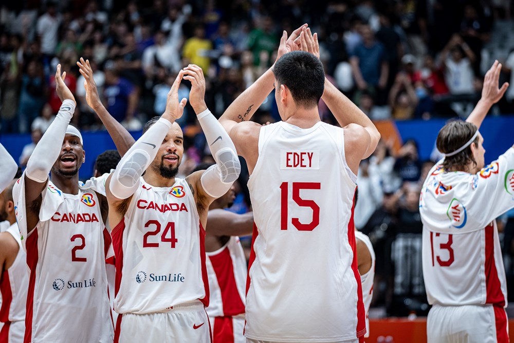 Canada celebrates following their 95 65 win over france in the 2023 fiba world cup