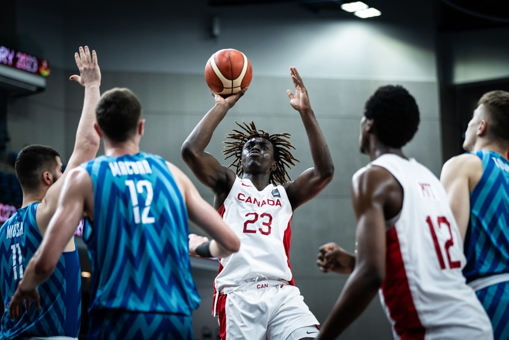 Canadian forward michael nwoko goes up for a shot attempt in the 90 to 69 win over slovenia at the 2023 fiba u19 world cup