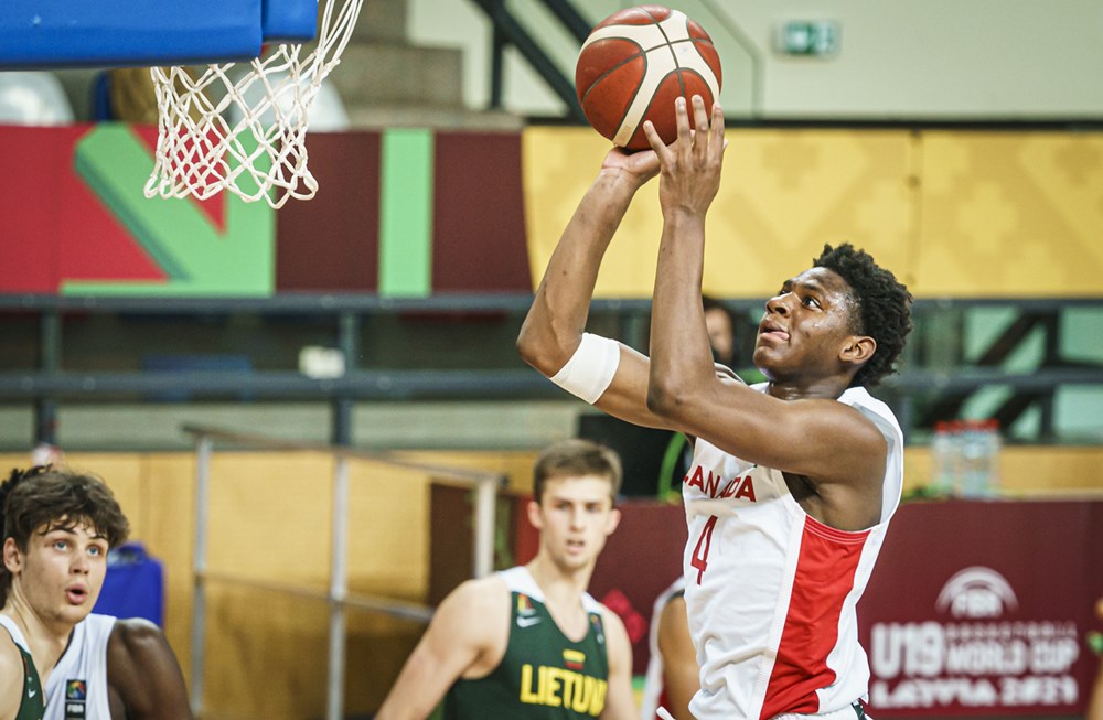 17-year-old Canadian basketball guard Elijah Fisher attacks the basket and helps Canada beat Lithuania at the 2021 FIBA U19 World Cup