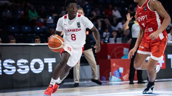 Canadian point guard miles sadler brings up the ball against egypt at the 2024 fiba u17 world cup
