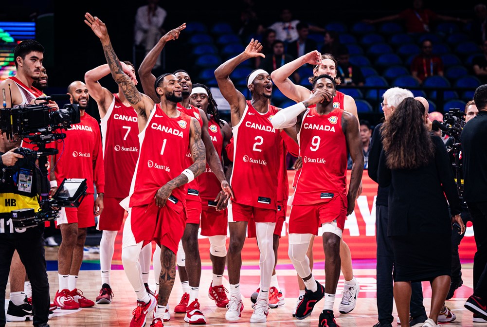 Canadians nickeil alexander walker shai gilgeous alexander rj barrett celebrate following canada bronze medal at the 2023 fiba world cup