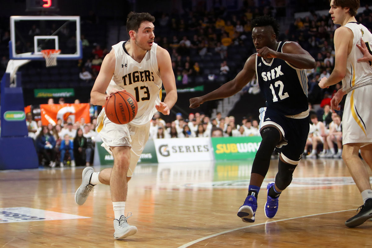 Dalhousie Tigers Alex Carson Goes To The Basket Against Stfx Xmen