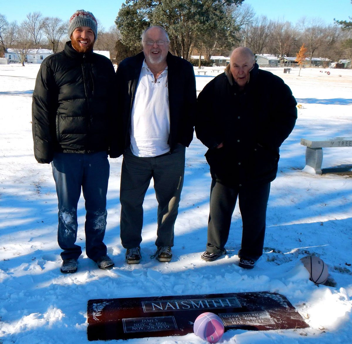 Danny sondreal curtis j phillips and george phillips at the grave of dr james naismith in lawrence kansas