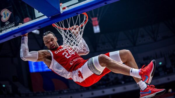 Dillon Brooks (10 points, 3 assists) hangs on the rim and slaps the backboard as Canada beats Lebanon 128-73 in 2023 FIBA World cup action