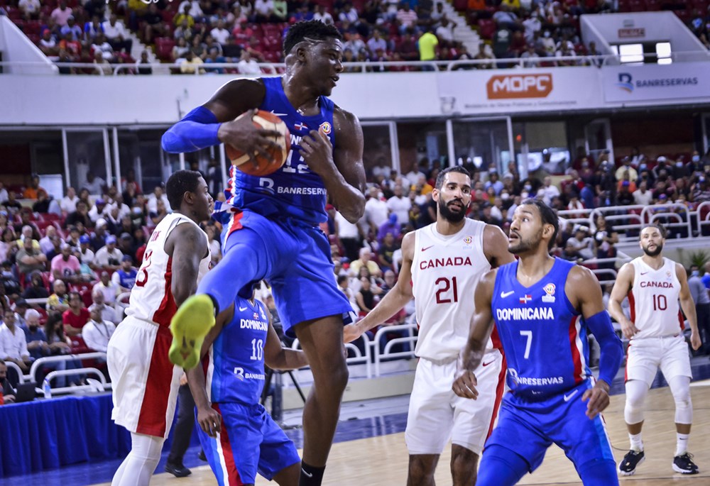 Dominican republic angel delgado pulls down rebound against canada 2023 fiba basketball world cup qualifiers