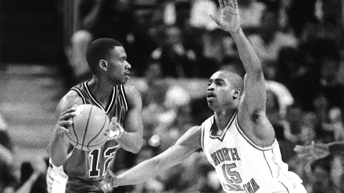 Fairfield stags canadian guard greg francis defended by north carolina tar heels star vince carter during the 1996 ncaa tournament