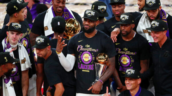 Four Time NBA Champion Lebron James Holding 2020 NBA Finals MVP Trophy