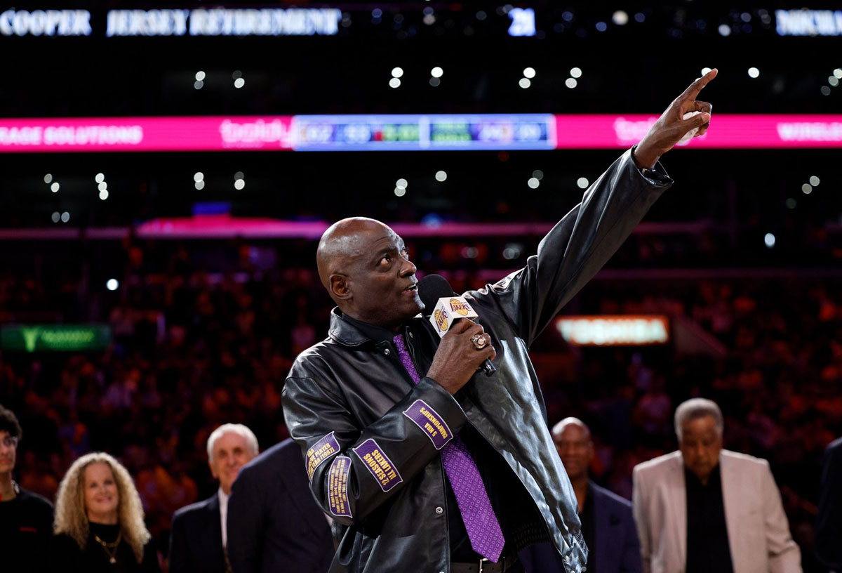 Hanging jerseys with Lakers legend Michael Cooper