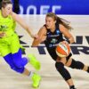 Sabrina Ionescu drives past Dallas Wings on her way to 33 points, 7 assists, 7 rebounds