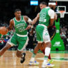 Boston Celtics guard Joe Johnson dribbles basketball as hardship times hit the nba