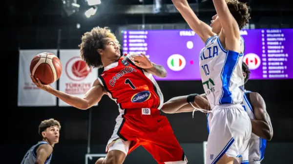 Kenyon St-Louis passes the ball during Canada’s FIBA U17 World Cup 2026 matchup against Italy.