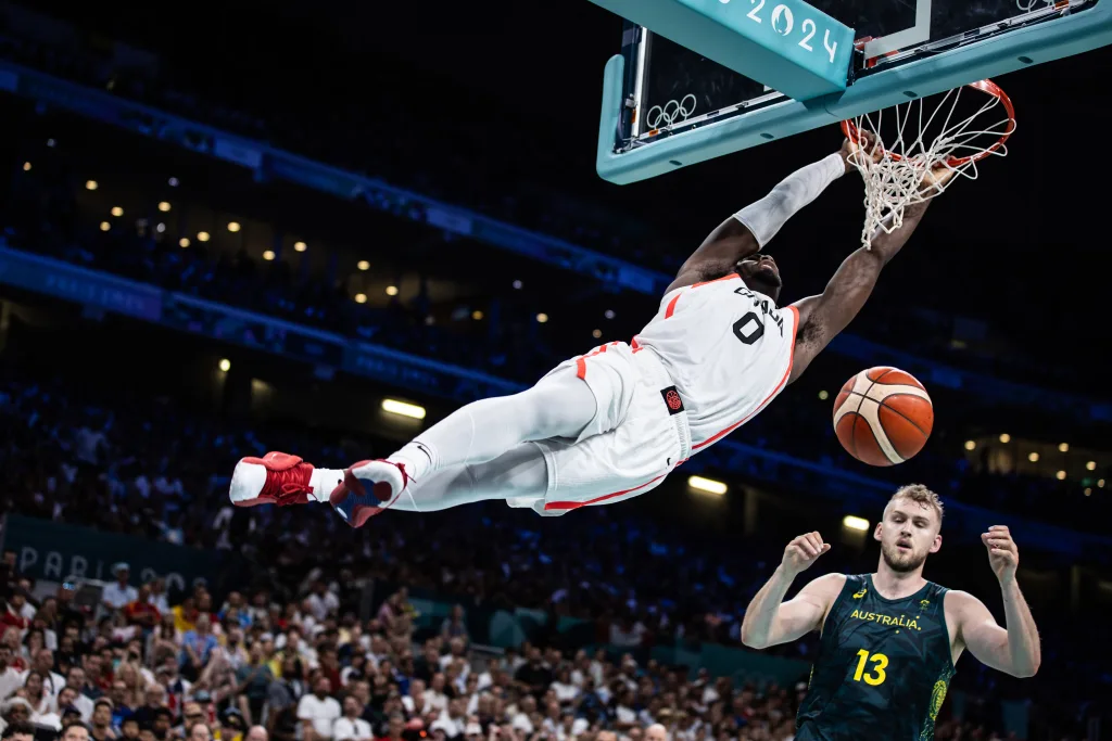 Luguentz dort finishes off a steal with highlight dunk versus australia 2024 paris olympics mens basketball action