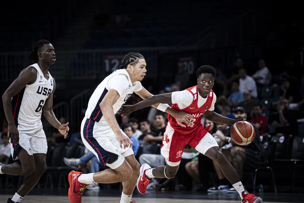 Miles sadler dribbling the ball against the united states during fiba u17 world cup quarter finals