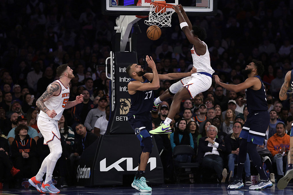 Newly acquired New York Knicks forward O.G Anunoby throws down a big two hand-dunk over Rudy Gobert and the Minnesotta Timberwolves. Anunoby finished with 17 points, and six rebounds in his debut at Madison Square Garden.