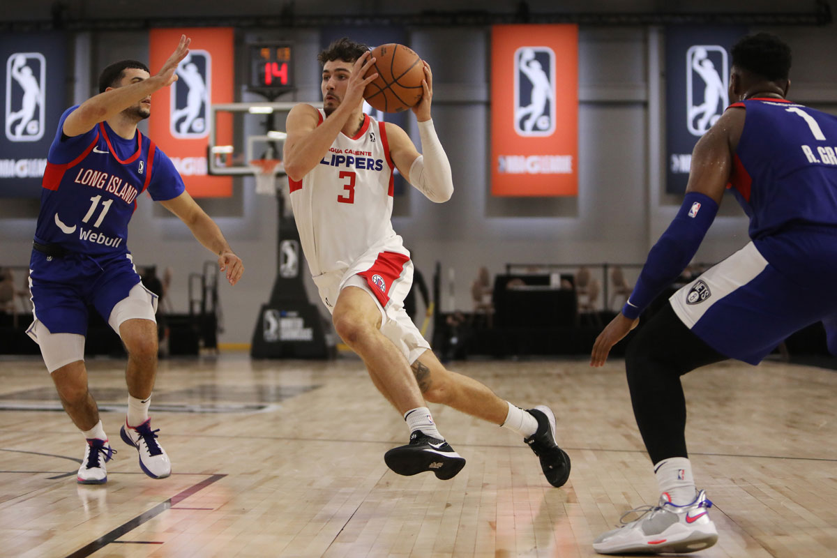 Ontario clippers canadian guard nate darling drives to the hoop against long island nets