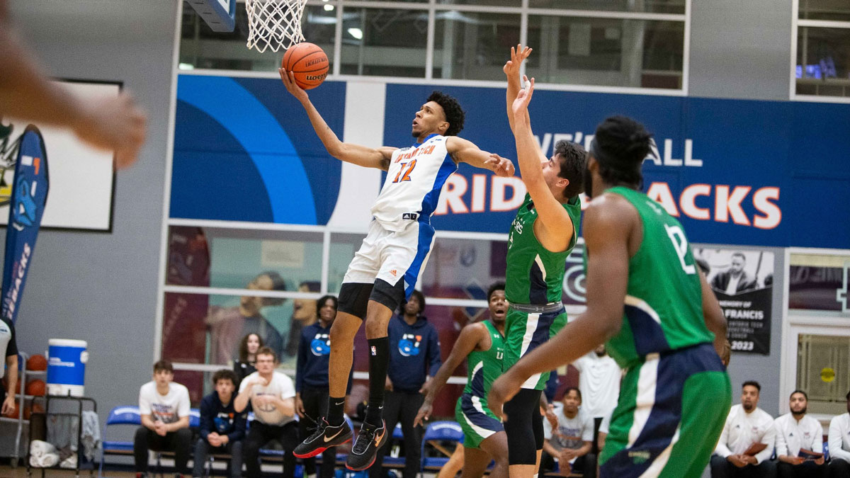 Ontario Tech Ridgebacks guard Keon Baker scoops in a right-handed layup. The upstart Ridgebacks reached the U Sports national rankings for the first time