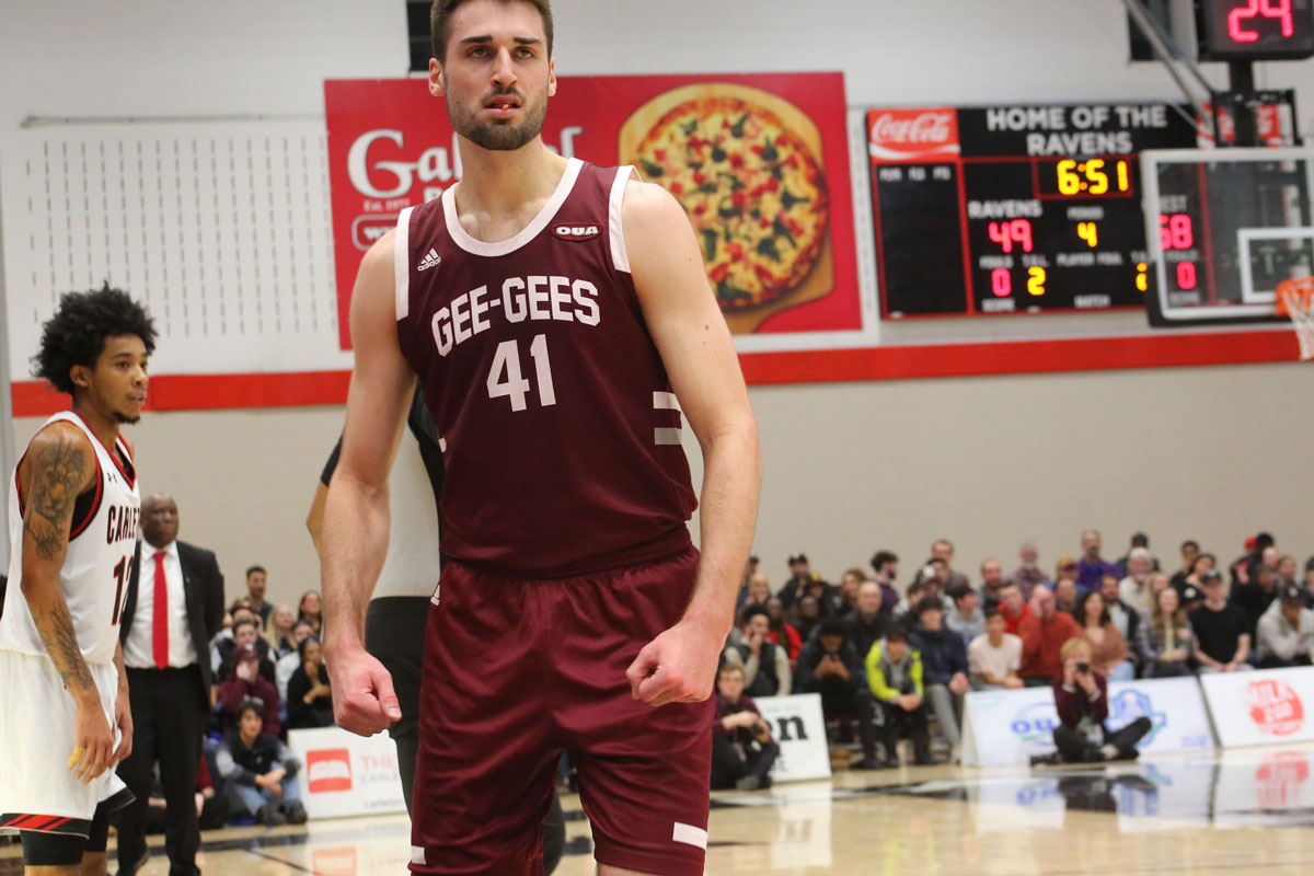 Ottawa gee gees forward guillaume pepin flexes muscles after big fourth quarter against the carleton ravens at 2023 oua championship game