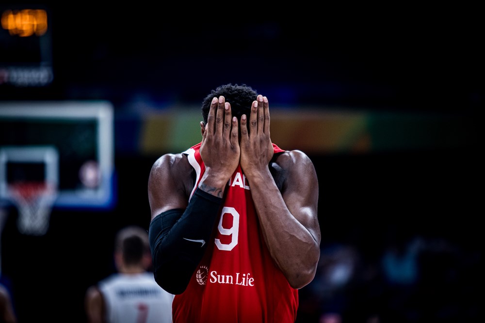 Rj barrett covers his face with hands during as canada falls 95 86 to serbia in the semi finals of the 2023 fiba world cup