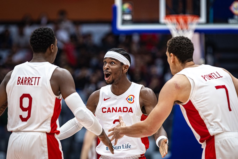 Rj barrett shai gilgeous alexander and dwight powell celebrate as canada beats latvia 101 75 to win preliminary group for first time in fiba world cup history