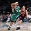 Ryan Nembhard dishes one of his record-breaking 23 assists against the Chicago Bulls at the American Airlines Center in Dallas, Texas, on April 12, 2026 — surpassing Steve Nash's 20-year-old Canadian NBA single-game assists record in the season finale.