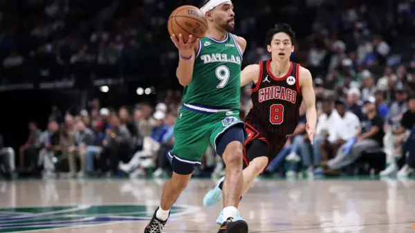 Ryan Nembhard dishes one of his record-breaking 23 assists against the Chicago Bulls at the American Airlines Center in Dallas, Texas, on April 12, 2026 — surpassing Steve Nash's 20-year-old Canadian NBA single-game assists record in the season finale.