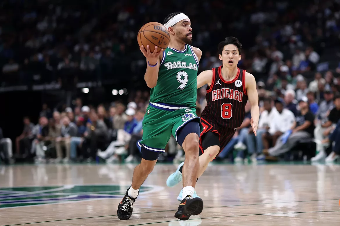 Ryan Nembhard dishes one of his record-breaking 23 assists against the Chicago Bulls at the American Airlines Center in Dallas, Texas, on April 12, 2026 — surpassing Steve Nash's 20-year-old Canadian NBA single-game assists record in the season finale.