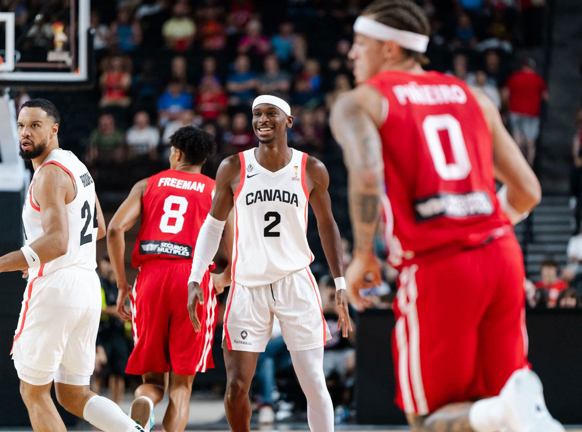 Shai Gilgeous-Alexander and Dillon Brooks share a smile during Canada's victory over Puerto Rico in a FIBA Basketball World Cup 2027 Americas Qualifier. 