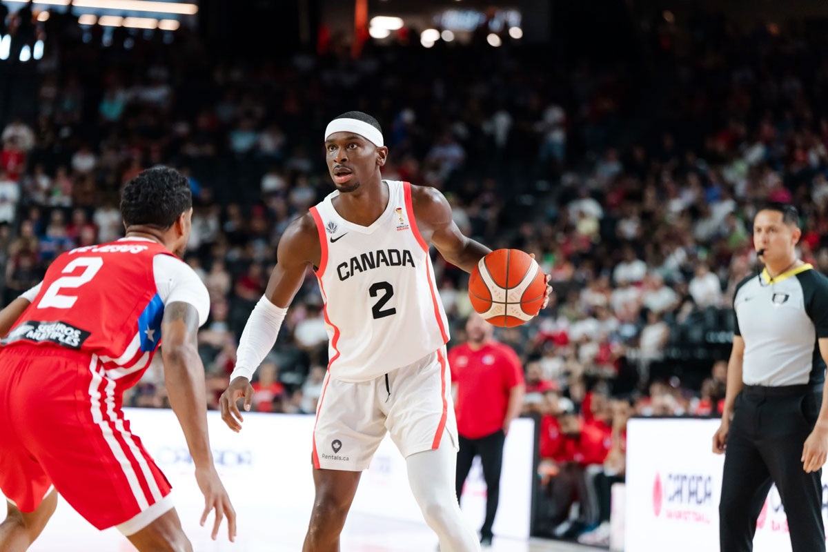 Shai Gilgeous-Alexander attacks the basket during Canada's 110-84 victory over Puerto Rico in a FIBA Basketball World Cup 2027 Americas Qualifier at TD Coliseum in Hamilton, Ont.
