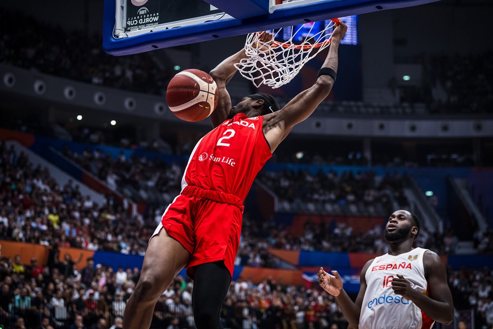 Shai gilgeous alexander throws down two hand dunk as canada beat spain 88 85 in 2023 fiba world cup second round