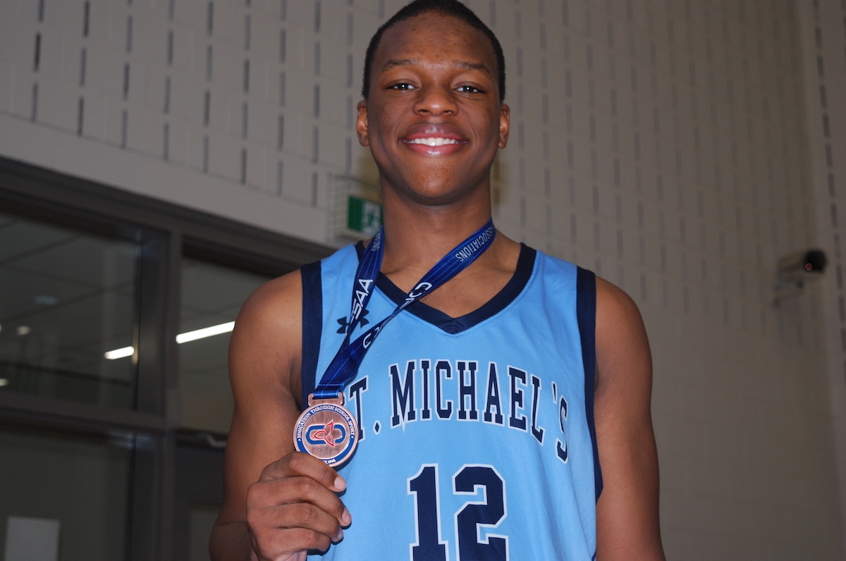 St. Michael's College standout Phoenyx Wyse holds his OFSAA bronze medal.