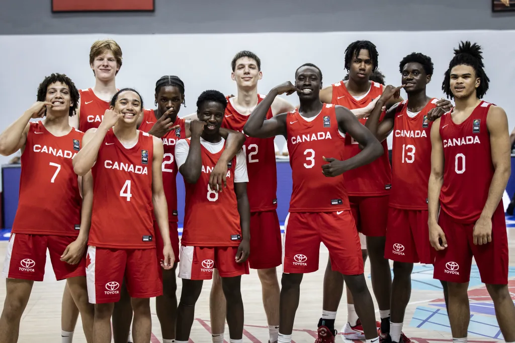 Team canada pose for a picture following their victory over argentina at 2024 fibau17 world cup