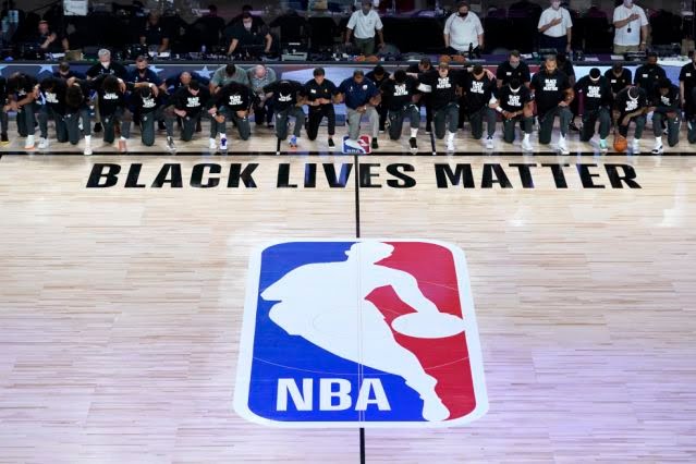 The NBA Takes A Knee In Unison Because Black Lives Matter