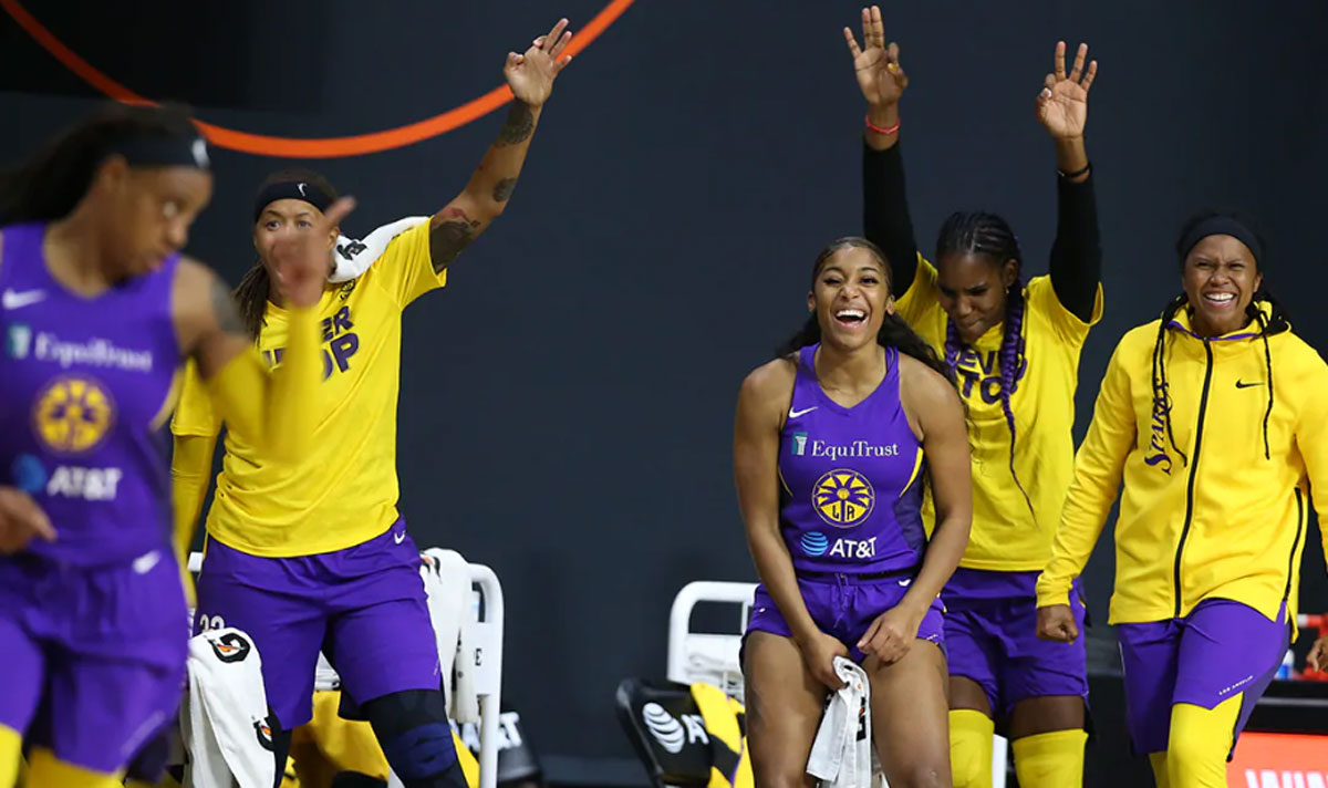 Los Angeles Sparks guards Jordin Canada (21), Te'a Cooper (2) and