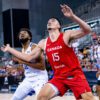 Zach Edey (6 points, 5 rebounds, 3 blocks) and Karl-Anthony Towns (20 points, 6 rebounds) battle for rebounding position during the Dominican Republic 94-88 win over Canada in FIBA World cup 2023 exhibition action in Granada, Spain.