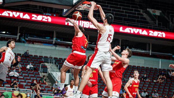 Canadian seven-foot-four center Zach Edey throws down big dunk over spain at the 2021 FIBA U19 World Cup. Team Canada will play rivals USA in the semi-finals.